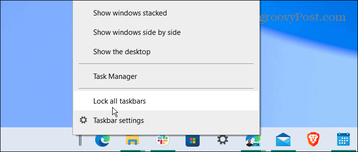 заблокировать все панели задач по центру панели задач windows 10